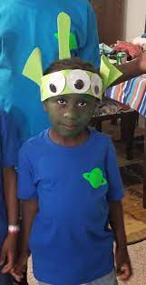 How To Create A Diy Costume Under 10 Disney Toy Story Alien Diy Costumes Kids Toy Story Costumes Diy Alien Costume