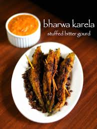 Stuffed Karela Recipe Bharwa Karela Recipe Karela Ka Bharwa Recipe Indian Food Recipes Vegetarian Recipes Recipe For Bitter Gourd