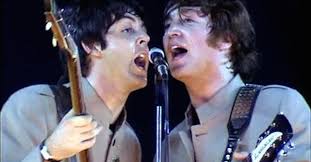 The beatles take to the stage at shea stadium. The Beatles At Shea Stadium Corporate Entertainment Dueling Pianos Cover Bands Holiday Parties Entertainment Private Parties Fundraisers Wedding Entertainment Howl2go