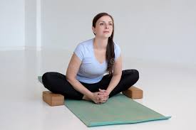 Improving flexibility in the groin and hip region. Woman Practicing Yoga Doing Butterfly Exercise Baddha Konasana Pose Stock Image Image Of Baddha Position 152066289
