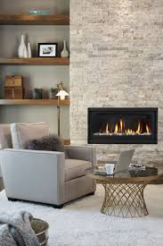 11 cozy photos of fireplaces that will make you want to stay inside all winter townandcountrymag co cozy living room design home fireplace family room design