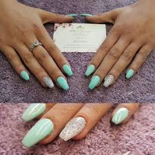 How to remove acrylic nails without damaging your nails. Mint Green And Silver Acrylic Nails Gel Polish Rounded Acrylic Nails Green Acrylic Nails Mint Green Nails