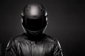 Every motorcyclist should own a leather jacket. Man Wearing A Black Leather Motorcycle Jacket And Helmet On Dark Background By Rzcreative Black Copy Space
