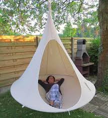 Yard swings can serve multiple functions. The Backyard Park Swing Hammock Scam Dave Cornthwaite