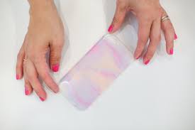 It clings to plastic better and it's varnish finish will last longer than regular acrylic paint. Diy Marbled Nail Polish Phone Case