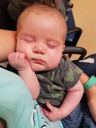 Moses got a new toy for being so good at the doctors today. They said he  has an amazing temperament and a great personality and is weighing in at  22.6lbs. Not sleepy