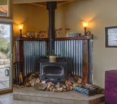 Corregated Metal With Wood Trim To Protect Wall Behind The Stove Stunning And Rustic Wood Stove Hearth Wood Stove Fireplace Rustic Bathroom Designs