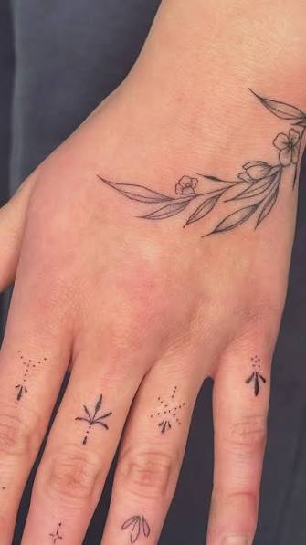 Vine wrap with some custom ornamental finger tats for her very first tattoo!! +, +, +, +, #utahtattooartists #smalltattoosforgirls #smalltattooinspo #utahtattoo #finelinetattooutah ...