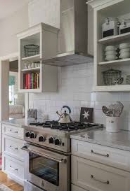 Modern Farmhouse Kitchen With Subway Tiles And Professional Gas Range New England Kitchen Decor Plates Kitchen Cabinet Styles Country Kitchen Cabinets