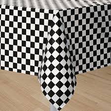 Your chair covers offers black tablecloths in wide variety of materials such as polyester, spandex, pintuck, glitz sequin, pinwheel, polka dot, lamour and satin. Giftexpress 2 Pack Black White Checkered Flag Table Cover Party Favor Checkered Tablecloth Disposable Checkered Racing Table Cover Check Table Cover Buy Online In Bermuda At Bermuda Desertcart Com Productid 30554581
