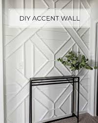 After caulking, we next used wood filler to cover all the holes from the nails and any seams we needed to cover. How To Build A Wood Trim Accent Wall