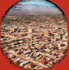 Ray Manley aerial photo cover of February 1958 issue of Arizona Highways  featuring Tucson Arizona by David Lee Guss