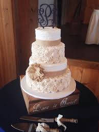 Rustic Wedding Cake With Burlap And Buttercream Rosettes By Amy Hart Wedding Cake Rustic Country Wedding Cakes Rustic Wedding Cake