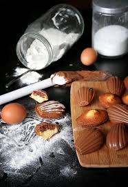 Madeleines Enrobees De Chocolat Et Coeur De Nutella Recettes De Cuisine Gouter Equilibre Madeleine Chocolat