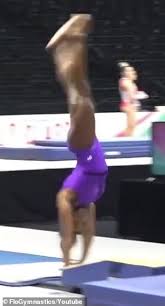 The vault, featuring a roundoff. 4cvppczmxu6qlm