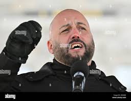 Quebec, Canada. 30th Mar, 2023. Eric Gingras, CSQ, speaks as a union common  front march together, Thursday, March 30, 2023 in front of the legislature  in Quebec City. Credit: The Canadian Press/Alamy