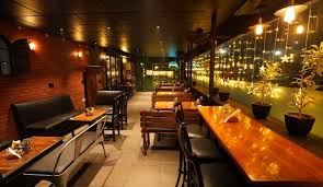 Restaurant wood & metal chairs: The Warehouse Cafe 10 Off On Food Soft Bev Bapu Nagar Jaipur Jaipur