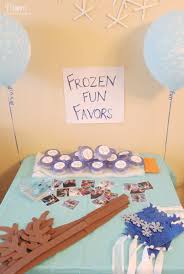 Frozen birthday party decorations for a winter wonderland in summer! Disney Frozen Birthday Party Mom Endeavors