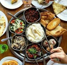 The bread is leavened and allowed to rise, and is shaped in various ways, usually with cheese in the middle and a crust which is ripped off and used to dip in the cheese. Pin By Tamar Cohen On Republic Of Georgia Georgia Food Georgian Cuisine Georgian Food