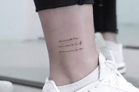 Amor vincit omnia temporary tattoo (set of 3). Amor Vincit Omnia