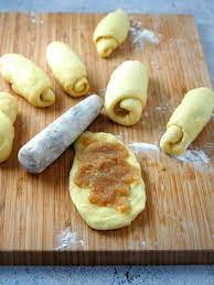 Spreading The Filling On The Bread Dough Spanish Bread Bread Recipes Homemade Filipino Bread Recipe