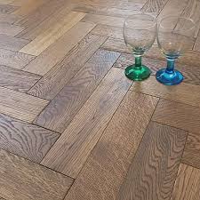 Uniform structure caused by natural growth. Herringbone Parquet 18mm Cubano Oak Brushed Matt Lacquer Engineered