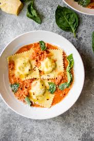 A 5 minute garlic and butter cream sauce that is a perfect topper for pasta, ravioli, shrimp, seafood or steak! Mushroom Ravioli With Tomato Vodka Sauce So Much Food