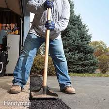 Finally, throw some sand or sweep some dust over your patch so it will blend in with your driveway and the patch material won't stick to your shoes or tires. How To Fix A Sinking Driveway Diy Family Handyman