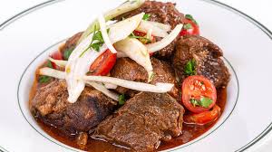 Sear the meat in a hot pan, then gently simmer it in a flavorful liquid until fork tender. Braised Beef Recipe Rachael Ray Show