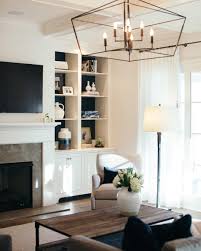 Georgia Street Design On Instagram Cozy Up Cltinteriordesigner Cltinter In 2020 Chandelier In Living Room Ceiling Lights Living Room Living Room Light Fixtures