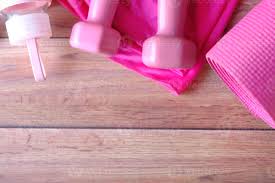995 on the janka scale. Pink Colored Dumbbell Exercise Mat And Water Bottle On Wooden Background 2028816 Stock Photo At Vecteezy