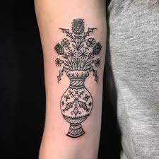 Black Ornamental Vase With Flowers Tattoo Vase With Flowers Tattoo Tattoos Vase Tattoo