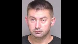 Charges: Man shot at police '20-22 times' during Pine Island standoff