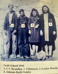 These four are thought to be the 8th grade Class at Swift 1n 1944.