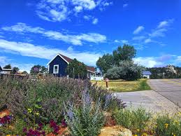 Covered porch to enjoy mountain views and cool evenings. River Rock Cottages Lodging And Vacation Rentals