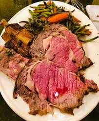 Prime rib, also known as a standing rib roast, is the undisputed king when it comes to a large cut of beef. Homemade Prime Rib With Roasted Vegetables And Mushroom Spinach Stuffing Food