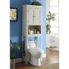 Using space above a standard toilet, the space saver has a hidden cabinet area behind doors and an open storage shelf which can meet all your storage needs. 4d Concepts Rancho 23 6 In W Space Saver Cabinet In Vanilla Cappuccino 90621 The Home Depot Bathroom Space Saver Over The Toilet Cabinet Toilet Storage