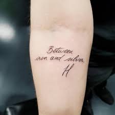 Hannibal Tattoo Between Iron And Silver On Samantha Amundson Hannibal Tattoo Tattoos Silver Tattoo