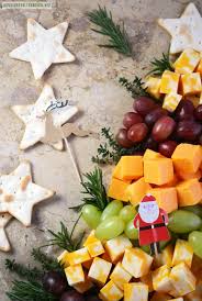 A christmas tree adorned with twinkling lights and ornaments is an essential holiday decoration. Easy Holiday Appetizer Christmas Tree Cheese Board Home Is Where The Boat Is