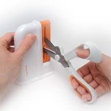 It compares two different scissors sharpeners. Universal Scissors Sharpener Fiskars Finland 8620 Fiskars Scissors Shears Www Kl24 Ee