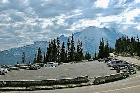 Aptly named, sunrise point's eastern location is best visited early in the morning when a newly rising sun illuminates the giant stratovolcano and the countless peaks that protect the mountain's base. Clouds Over Mt Rainier From Sunrise Point Parking Lot Mt Rainier National Park Washington Photograph By Ruth Hager