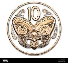 New Zealand coin: 10c. Māori carved mask / koruru with Māori rafter  patterns Stock Photo - Alamy