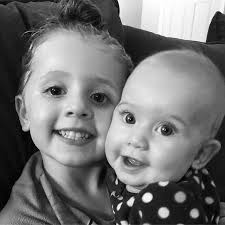 Eden and Eleanor Finney, daughters of Master Sgt. Sean