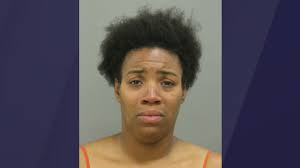 Mother charged in deadly South Chicago shooting of 12-year-old son