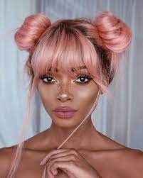 Add some accessories to get a pretty look. Two Buns Hairstyle With Bangs Novocom Top