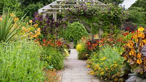 A Masterclass In Late Summer Garden Planting From Wollerton Old Hall Verve Garden Design Garden Borders Garden Design Planting Flowers