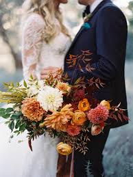 This diy fall wedding centerpiece, and decorations are going to look amazing for a rustic theme, fall theme, burlap theme, pumpkin theme, or sunflower theme wedding. 45 Cozy Fall Wedding Ideas Hgtv