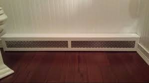 Made This Radiator Cover In Less Than An Hour I Used Lattice Strips And Chair Rail From Home Depot Then Glued On T Baseboard Heater Covers Radiator Cover Home