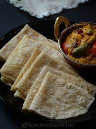 Rumali Roti Is A Paper Thin Mughlai Style Flat Bread Which Can Be Folded Like A Handkerchief Infact The Term Quot Rumali Rumali Roti Rasgulla Recipe Recipes