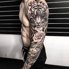 25 Coolest Sleeve Tattoos For Men Best Sleeve Tattoos Tiger Tattoo Sleeve Full Sleeve Tattoos